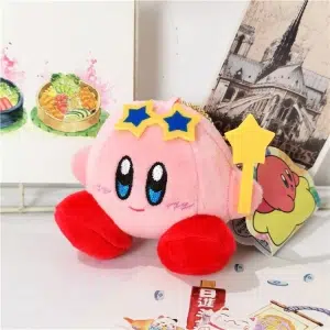 Plüschtier Kirby in rosa mit blauen Sternen auf dem Kopf