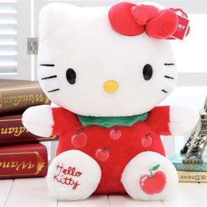 Hello Kitty Plüschtier mit rotem Schmetterling, der vor Büchern sitzt