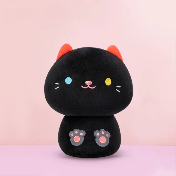 Plüschtierkissen in Form eines niedlichen Tieres schwarze Katze auf rosafarbenem Hintergrund
